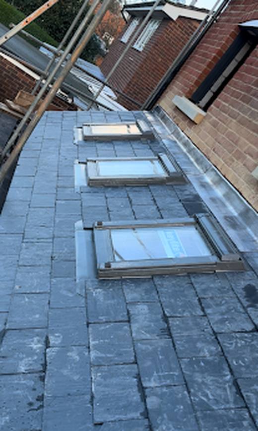 New slate roof with roof windows by Marshall Roofing
