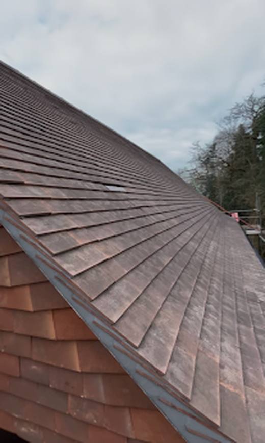 Roof replacement in HF Wethered clay tiles by Marshall Roofing